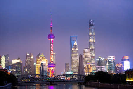 Shanghai, China - Jan 11, 2019: Shanghai Skyline bright at night with bright skyscraper with wuson...