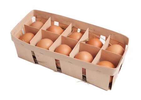 Eggs in box isolated on whiteの写真素材