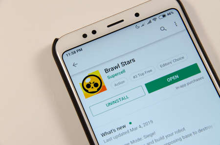 April, 2019. Kramatorsk, Ukraine. Brawl Stars gameplay on a white smartphone in handsのeditorial素材