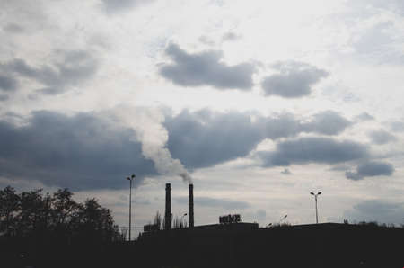 Bright blue sky over the city, park, lanterns, plants, power plantsのeditorial素材