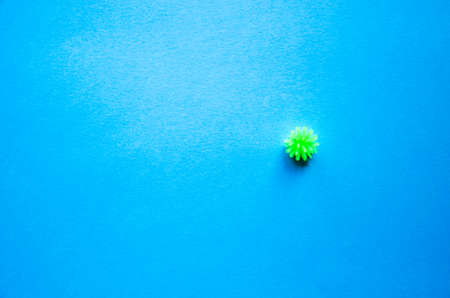 Nucleus, Coronavirus molecule. Flu virus of green and red color on a blue background. Flu vaccine,...