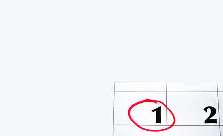 The first number in the calendar is circled in red in macro. Calendar for plans, notes, meetings. Business  calendar.の写真素材