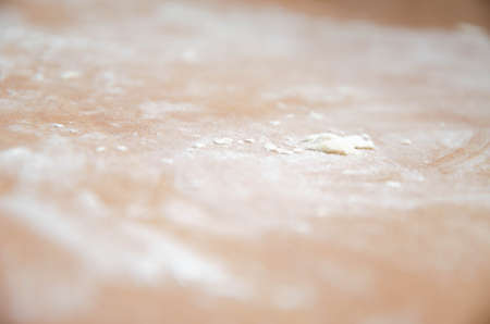 Flour on the table. Small lumps of dough on the table. Cocaine like flourの写真素材