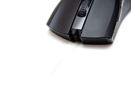 Black gaming mouse with side extra keys and a matte finish on white background. Mouse front view...