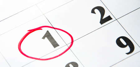 The first number in the calendar is circled in red in macro. Calendar for plans, notes, meetings. Business  calendar.の写真素材