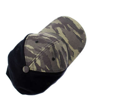 Men's two-tone cap on a white background. The baseball cap is black at the back, front and visor of the military workshop, khaki camouflage. Men's black cap with camouflage in macro. Side view, stern, top. Cap closure, button on top, ventilation holeの写真素材