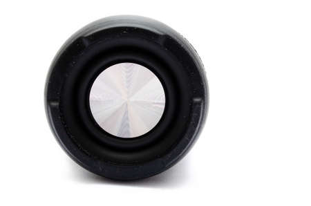 Wireless bluetooth color camouflage military column on a white background. The speaker lies on the table passive speaker, passive emitter, diffuser, bass forward. Side and front columnのeditorial素材