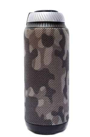 Wireless bluetooth color camouflage military column on a white background. The speaker is upright, the volume wheel and the control panel are on topのeditorial素材