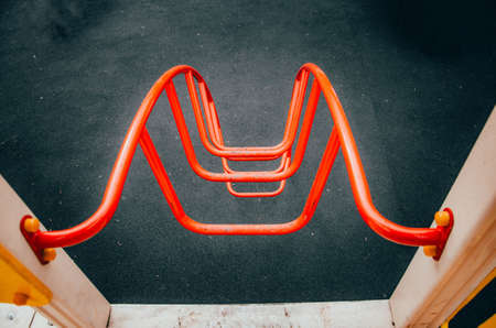 Metal stairs, red stairs in the playgroundの写真素材
