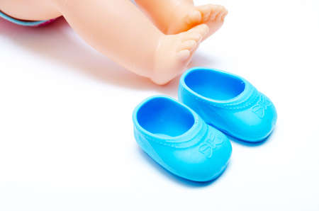 Original doll Baby Born on a white background in close-up. Doll general plan and in close-up to...