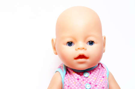 Original doll Baby Born on a white background in close-up. Doll general plan and in close-up to separate parts of the body, face. Baby Born. July 2020. Los Angeles, USAの写真素材