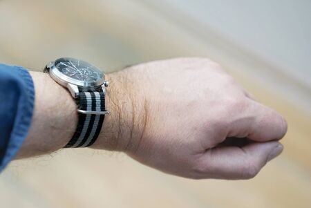 classic men's watch on the wristの写真素材
