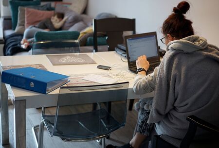 woman during home-office works remotely