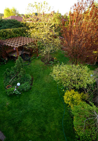 top view of the backyard garden with gazebo and lawn