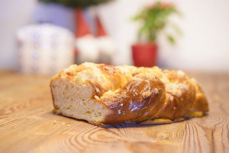 Homemade Challah on an old wooden table