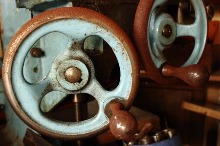 An Old Rusted Lathe Turning Wheel for Precision Engineeringの写真素材