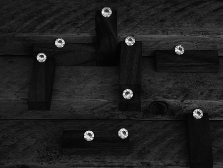 In and Out of Focus Scattered Diamonds, Showing the Fake Gem Stones on Hard Wooden Plinths on Planks and Pine Steps.の写真素材