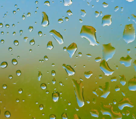 Drops of water on glass. An effective background.