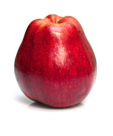 ripe red apple isolated on the whiteの写真素材