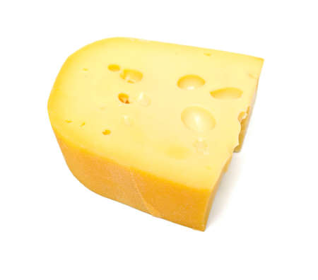 Chunk of tasty cheese on whiteの写真素材