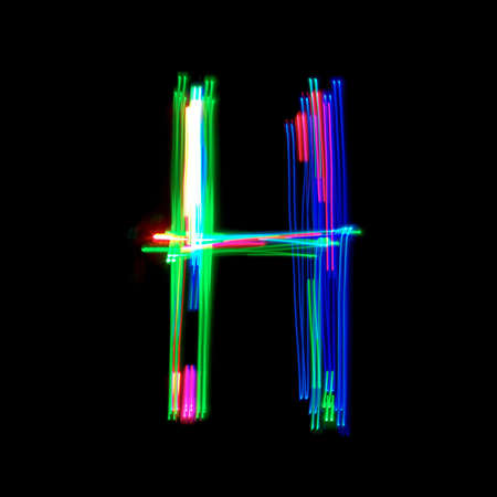 Letter of English alphabet on black. の写真素材