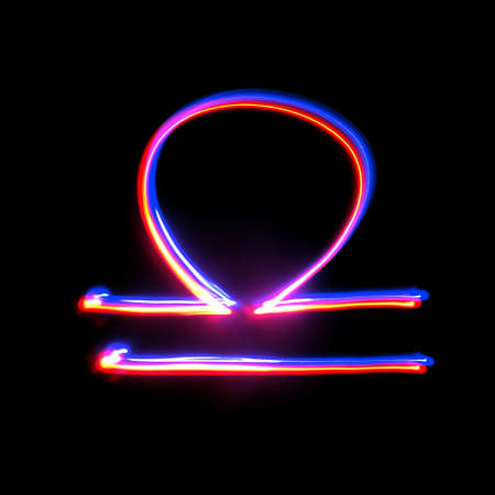 Signs of the zodiac on a black background. Freezelight. photography style