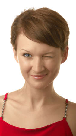 Beautiful girl in a red dress. Isolation, a white background. Closeup portrait.の写真素材