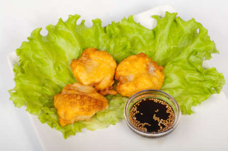 The japanese tempura hotate on a white plateの写真素材