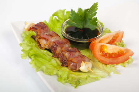 Japanese yakitori with hearts on a white plateの写真素材