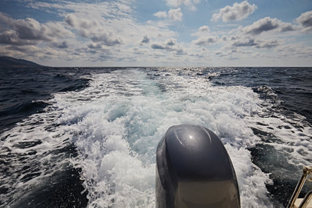 A trace in the sea from a boat motor at speedの写真素材