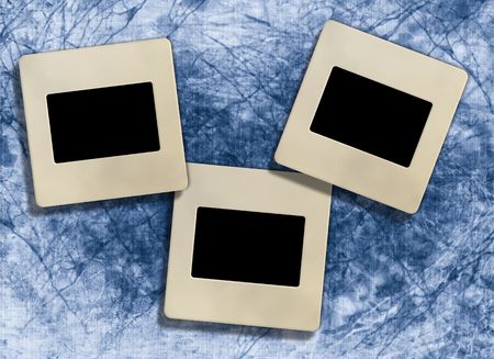  three retro blank  slide photo framework against an blue old paper, grunge background.の写真素材