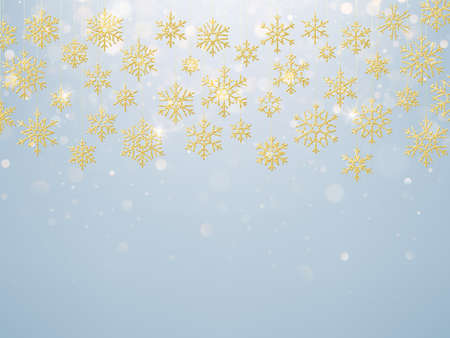 Christmas card with foiled gold snow flake. Golden decoration on light blue winter background.