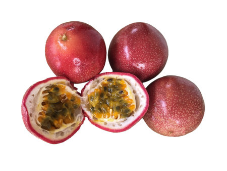 Fresh red passion fruits isolated in white backgroundの写真素材
