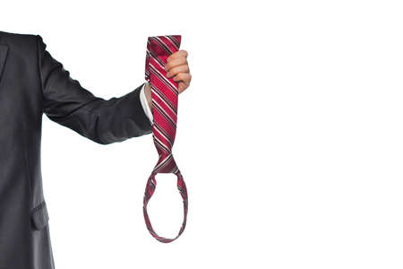 businessman holding a striped tie, isolated imageの写真素材