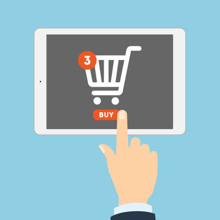 Internet shopping concept. Hand pulling buy button on tablet. Three items in shopping cart. E-commerce concept. Shopping online.のイラスト素材