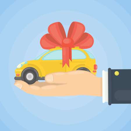 Car gift on hand. Yellow car with red ribbon.のイラスト素材