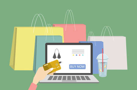 Online shopping concept. Desktop with computers, shopping bags and discount cards.のイラスト素材