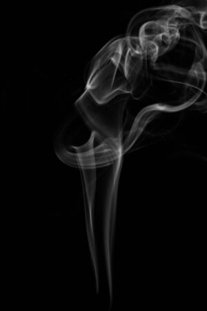 White smoke on black background, abstractの写真素材
