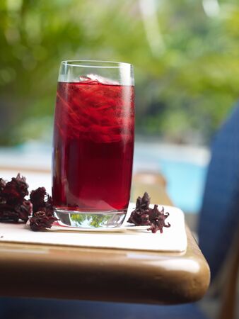 roselle mocktail on wood tableの写真素材