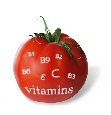one red tomato with vitamins listの写真素材