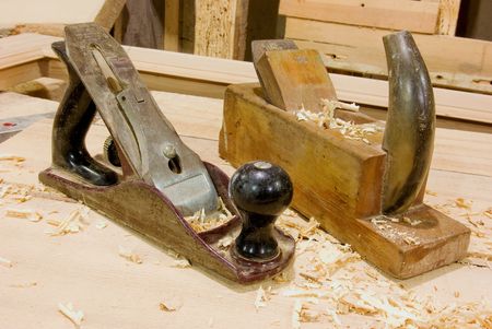 woodworker desktop. metallic and wooden planeの写真素材
