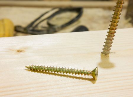 Two wood screwの写真素材