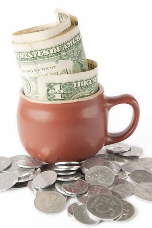 Brown Pot with Coins and dollar on Whiteの写真素材