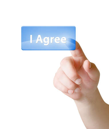 Finger press on I Agree buttonの写真素材