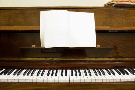 piano with blank notes paperの写真素材