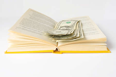 Open book with dollar moneyの写真素材