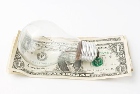 lamp on money backgroundの写真素材