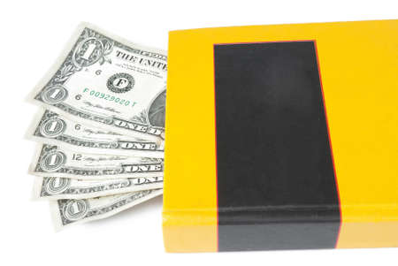 Closed book with dollarの写真素材