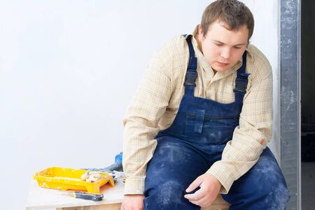 portrait of tired  workerの写真素材