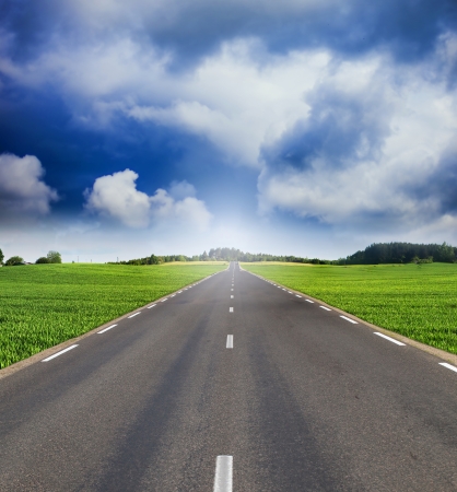 Green field and roadの写真素材